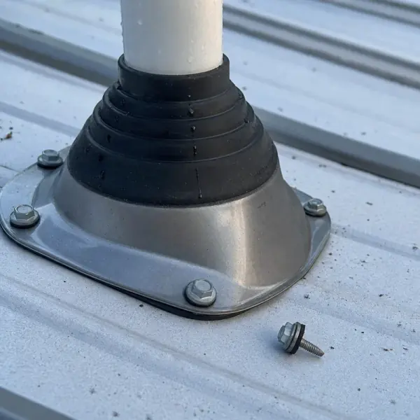 Detailed metal roof repair work